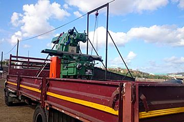 Ajax milling machine loaded on a truck for delivery
